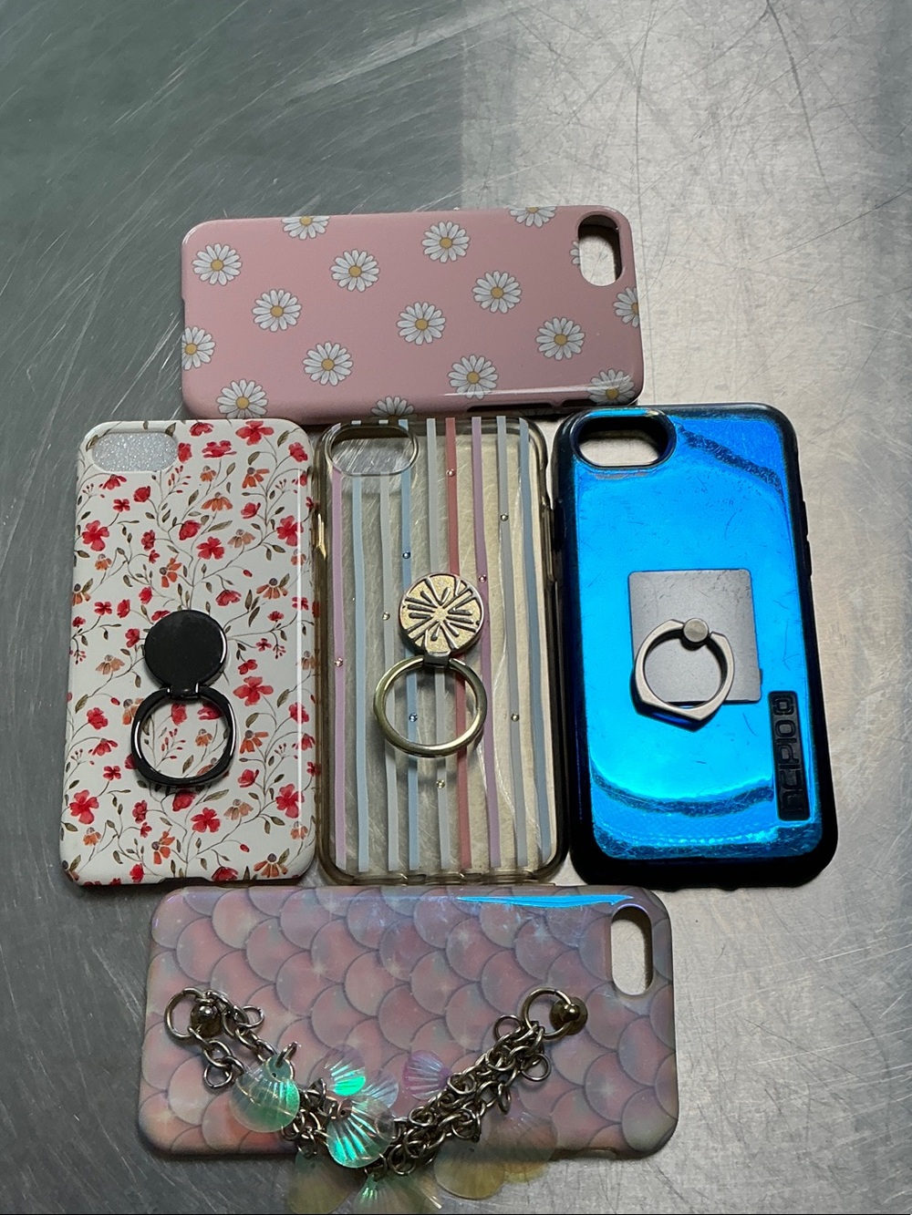 5 cases for IPhone 8SE  gently used.